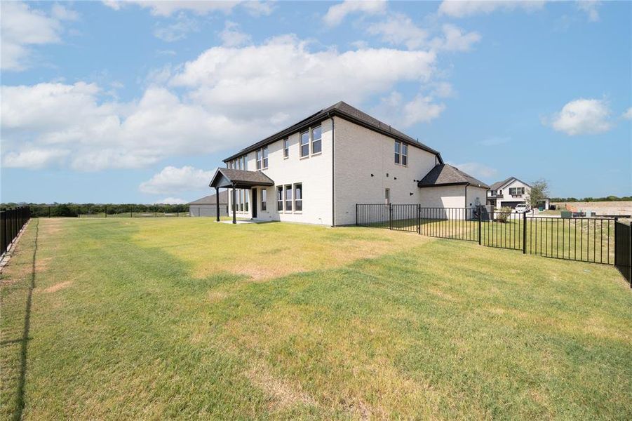 Front exterior of a new home in Heath Golf and Yacht Club, Heath, TX, highlighting curb appeal (Image 18).