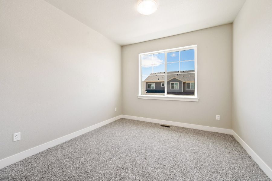 Spacious, unfurnished interior of a new home in The Lakes at Centerra, Loveland (Image 17).