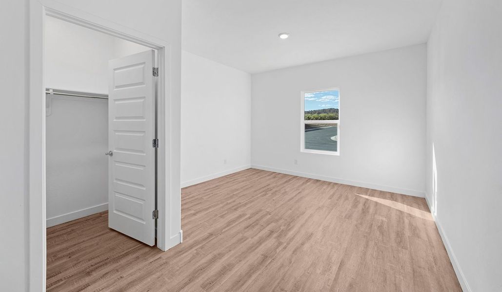 Spacious, unfurnished interior of a new home in Solterra, Green Valley (Image 23).
