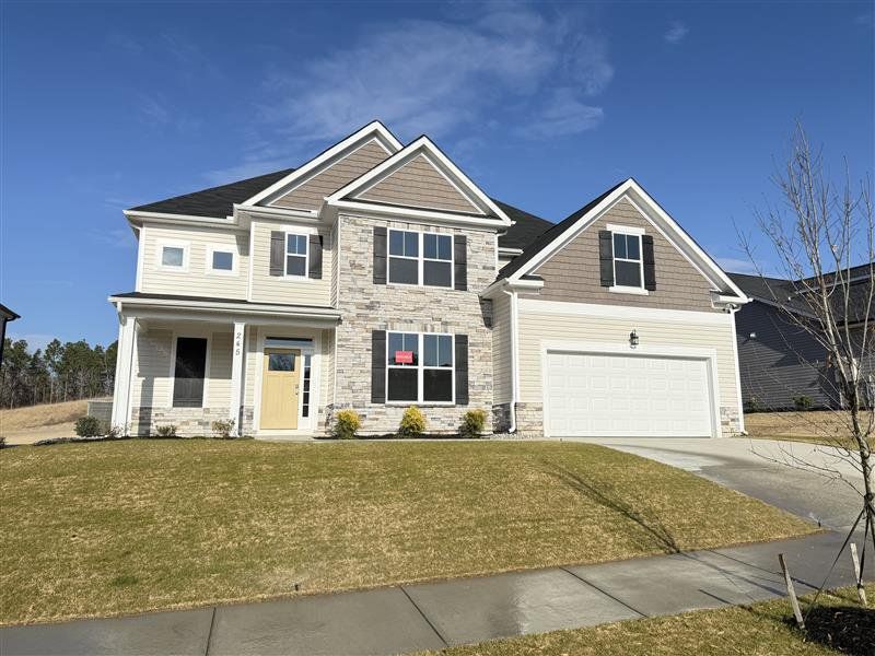Front exterior of a new home in Windsor, North Augusta, SC, highlighting curb appeal (Image 1). Front exterior of a new home in Windsor, North Augusta, SC, highlighting curb appeal (Image 1).