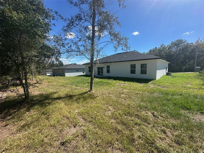 Exterior details and patio area of a home in , Citrus Springs (Image 27).