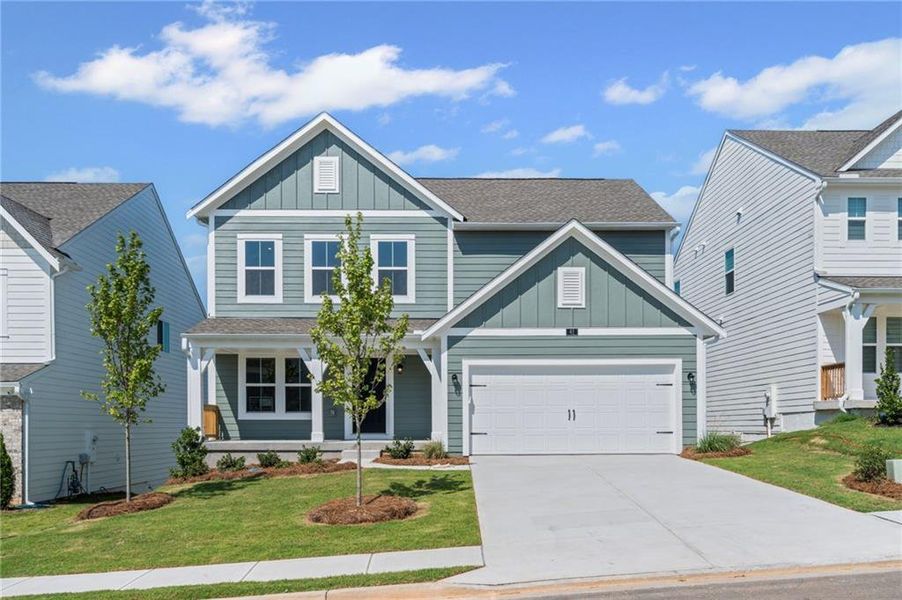 Front exterior of a new home in Twin Lakes, Braselton, GA, highlighting curb appeal (Image 24).