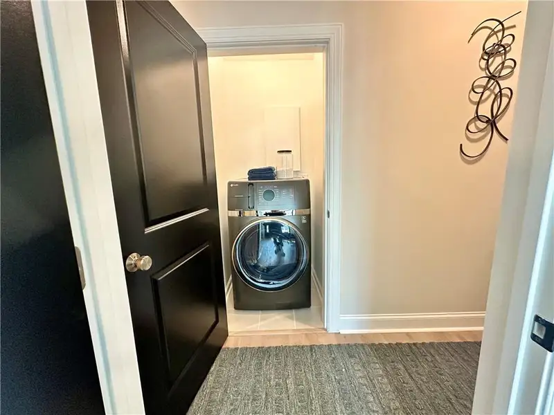 Furnished interior view inside a new home in Market Square at Sawnee Village, Cumming (Image 18).