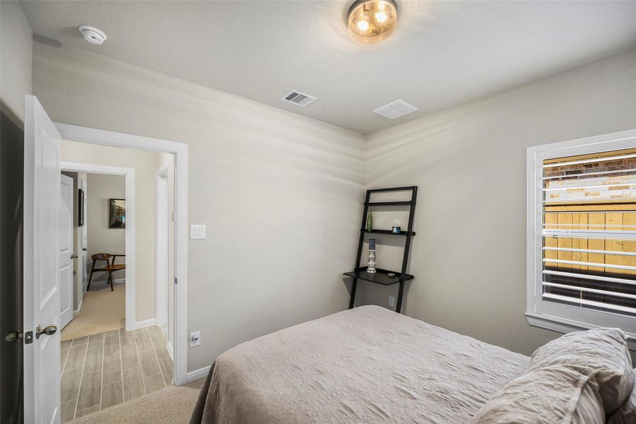 Furnished interior view inside a new home in The Highlands - Grove Collection, Porter (Image 19).