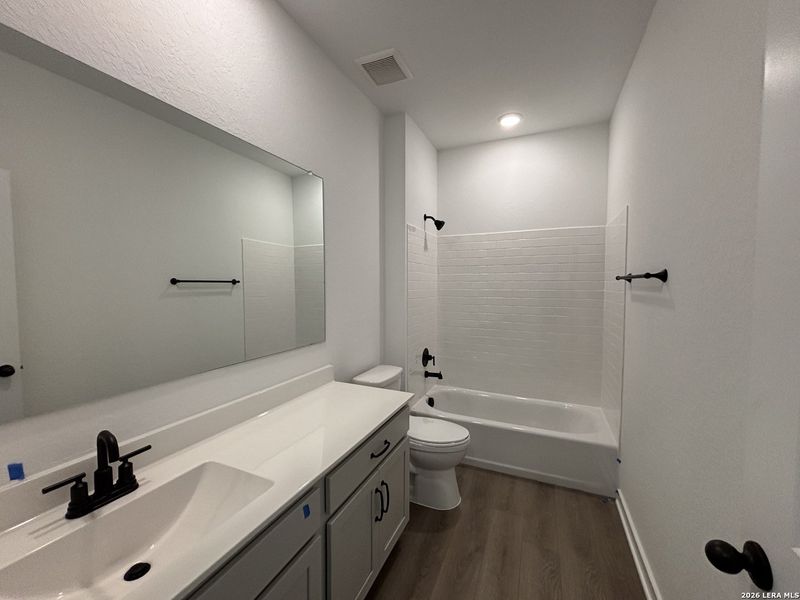 Furnished interior view inside a new home in The Summit at Saddlebrook Ranch 55's, Schertz (Image 18).