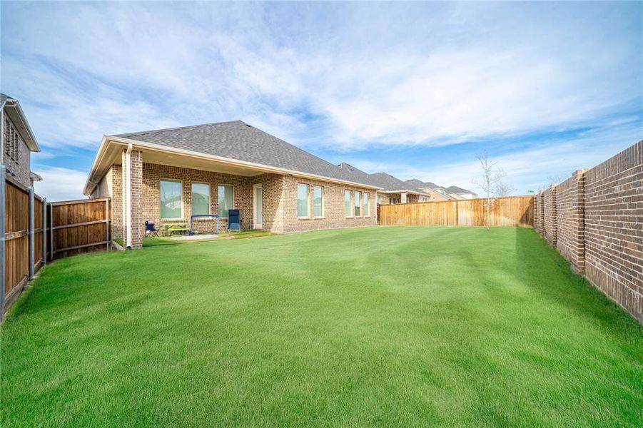 Exterior details and patio area of a home in , Little Elm (Image 3).