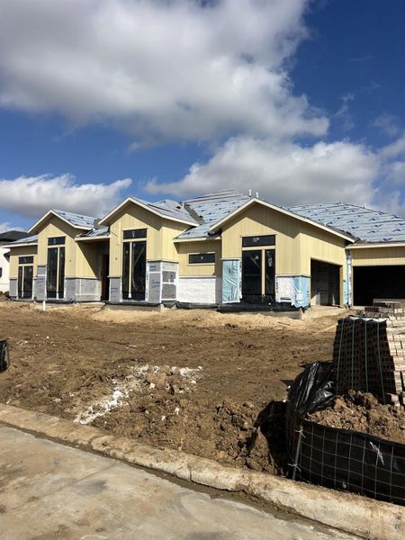 The exterior will be finished with the shade of "Glacier Bay" brick and "Iron Ore" Stucco.