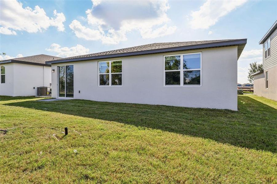 Exterior details and patio area of a home in Crosswinds - Signature Series, Haines City (Image 18).