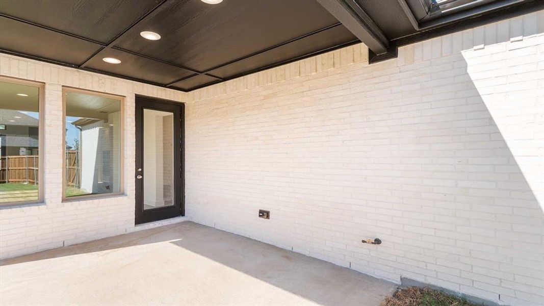 Exterior details and patio area of a home in The Parks At Wilson Creek 40', Celina (Image 3).