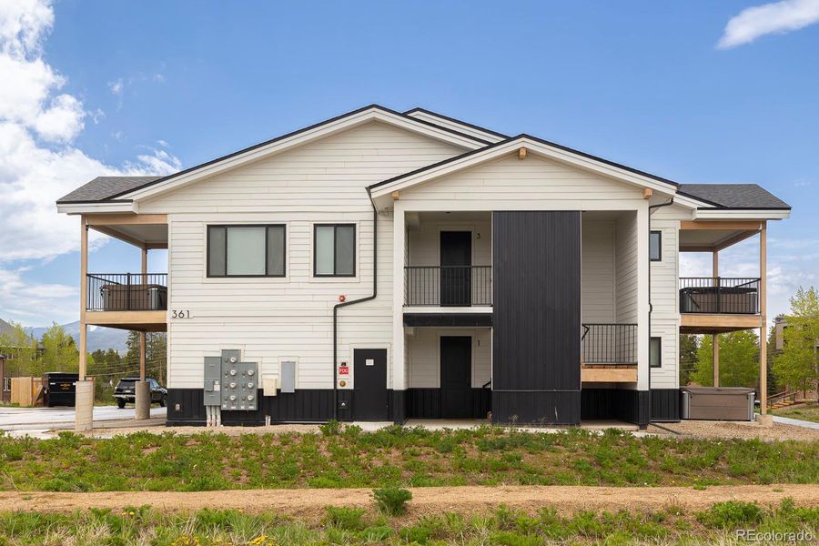 Front exterior of a new home in , Fraser, CO, highlighting curb appeal (Image 1).