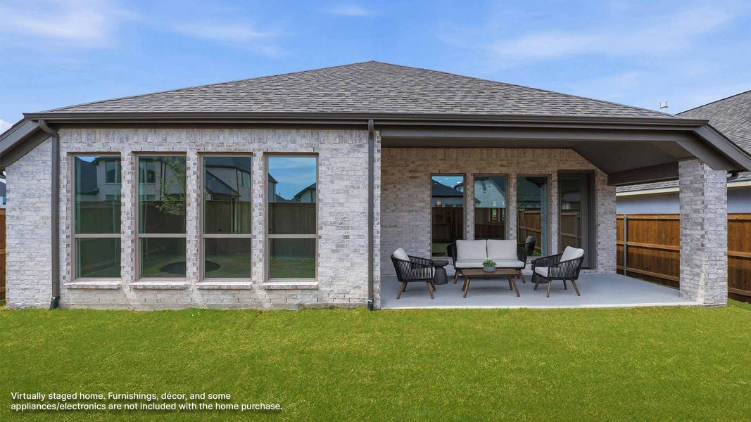 Exterior details and patio area of a home in Cambridge Crossing, Celina (Image 3).