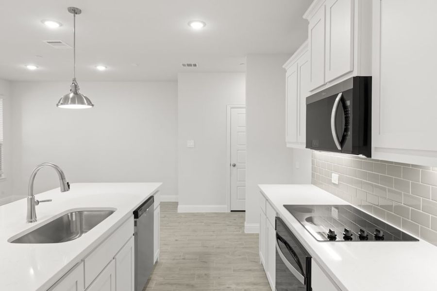 Front exterior of a new home in Sereno Oaks at Buckner Terrace, Dallas, TX, highlighting curb appeal (Image 10). Front exterior of a new home in Sereno Oaks at Buckner Terrace, Dallas, TX, highlighting curb appeal (Image 10).