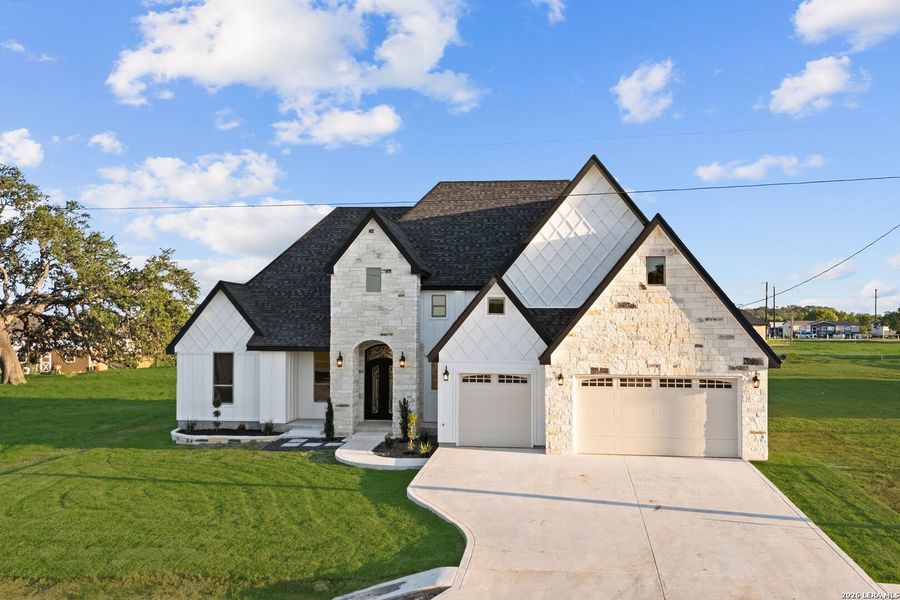 Front exterior of a new home in , Atascosa, TX, highlighting curb appeal (Image 25).