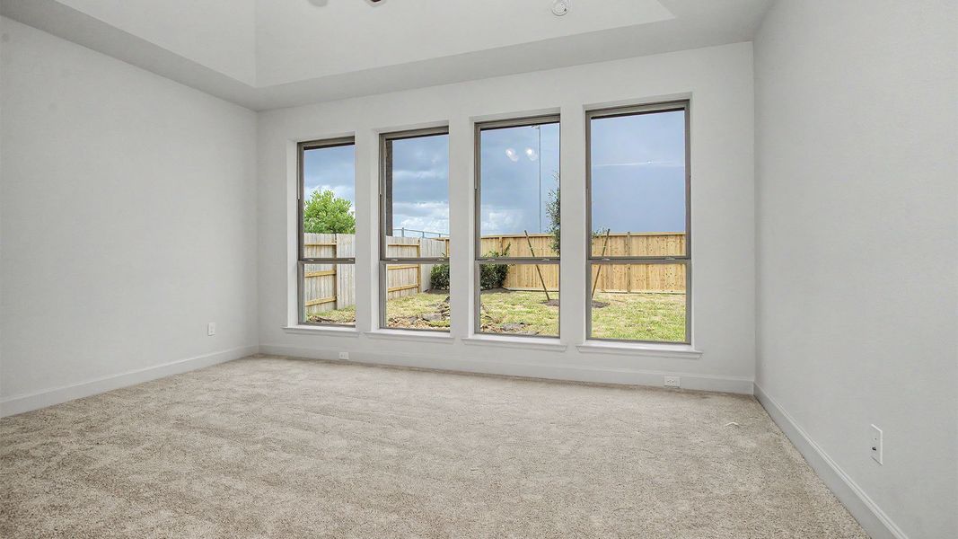 Spacious, unfurnished interior of a new home in Legacy Prairie at Katy Court, Katy (Image 8).