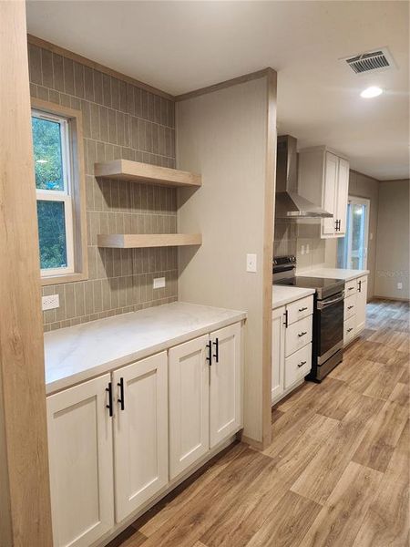 Furnished interior view inside a new home in , Dunnellon (Image 5).