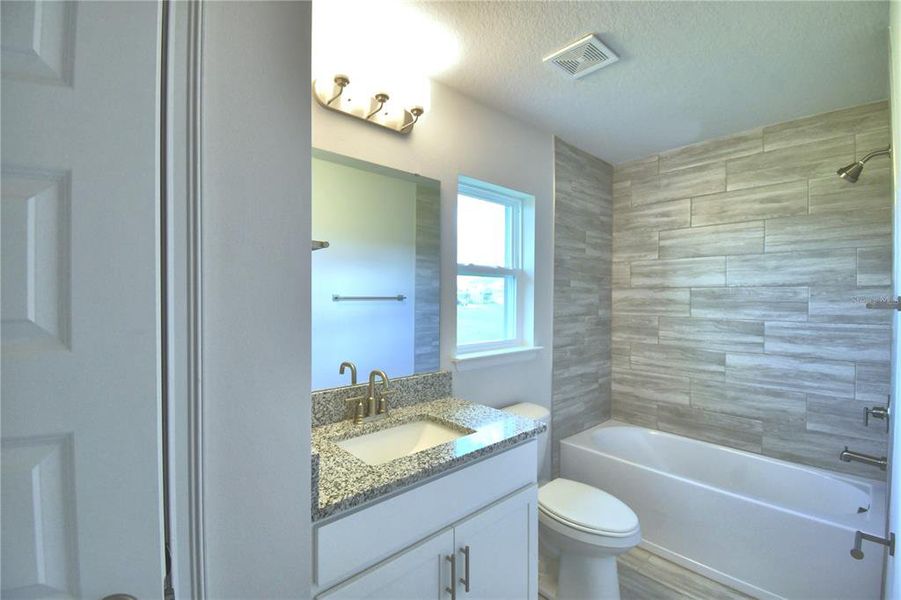 Furnished interior view inside a new home in , Auburndale (Image 36).