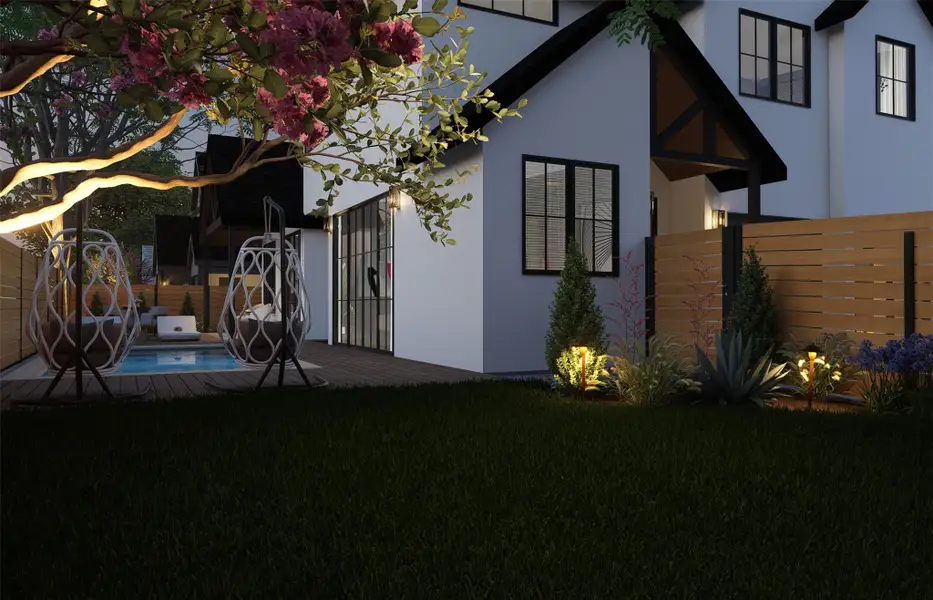 A manicured lawn and wooden deck surround the backyard pool of this modern gabled residence. A manicured lawn and wooden deck surround the backyard pool of this modern gabled residence.
