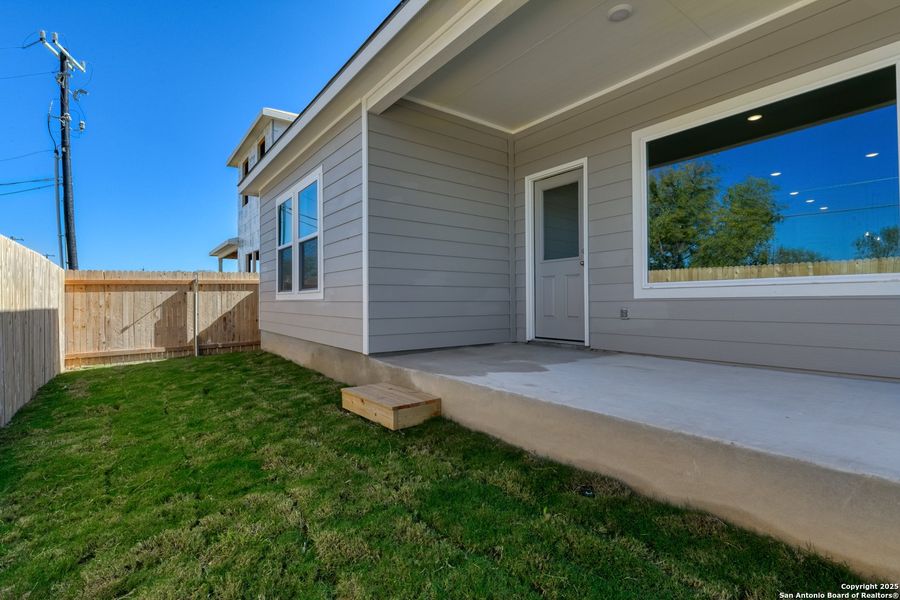 Exterior details and patio area of a home in Meadows at Hennersby Hollow 40's, San Antonio (Image 4). Exterior details and patio area of a home in Meadows at Hennersby Hollow 40's, San Antonio (Image 4).