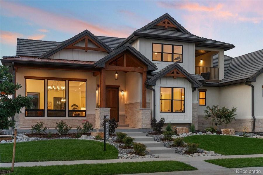 Front exterior of a new home in , Berthoud, CO, highlighting curb appeal (Image 21).