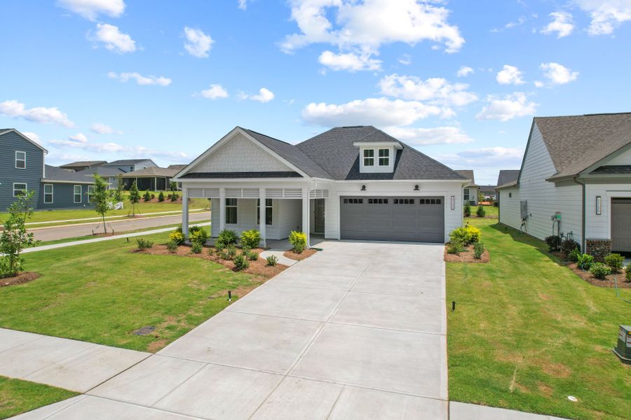 Front exterior of a new home in Carolina Riverside, Belmont, NC, highlighting curb appeal (Image 33).