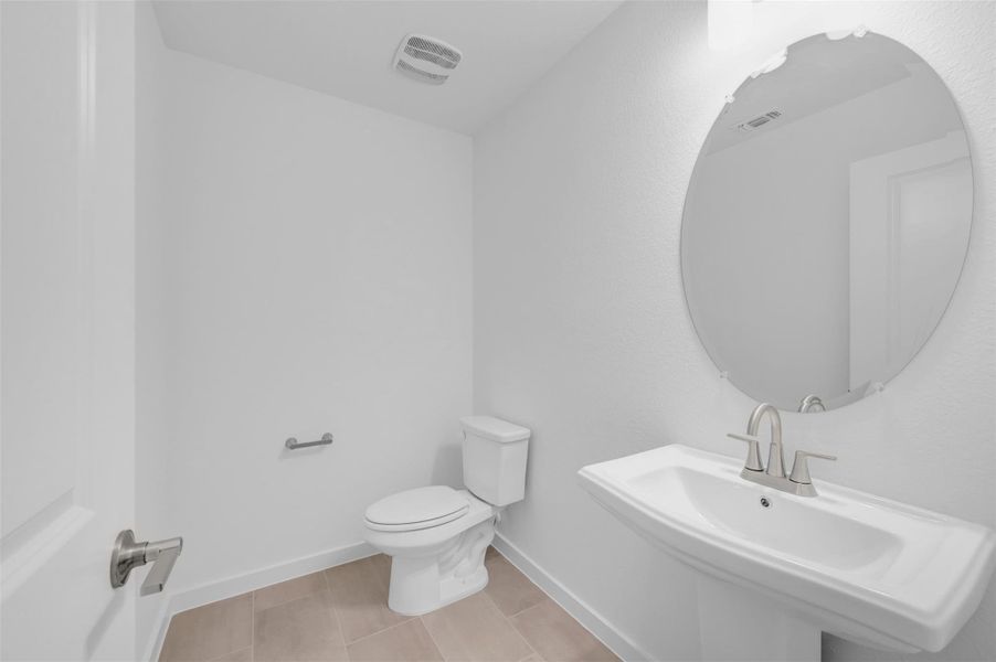 Furnished interior view inside a new home in Edgewood, Leander (Image 11). Furnished interior view inside a new home in Edgewood, Leander (Image 11).