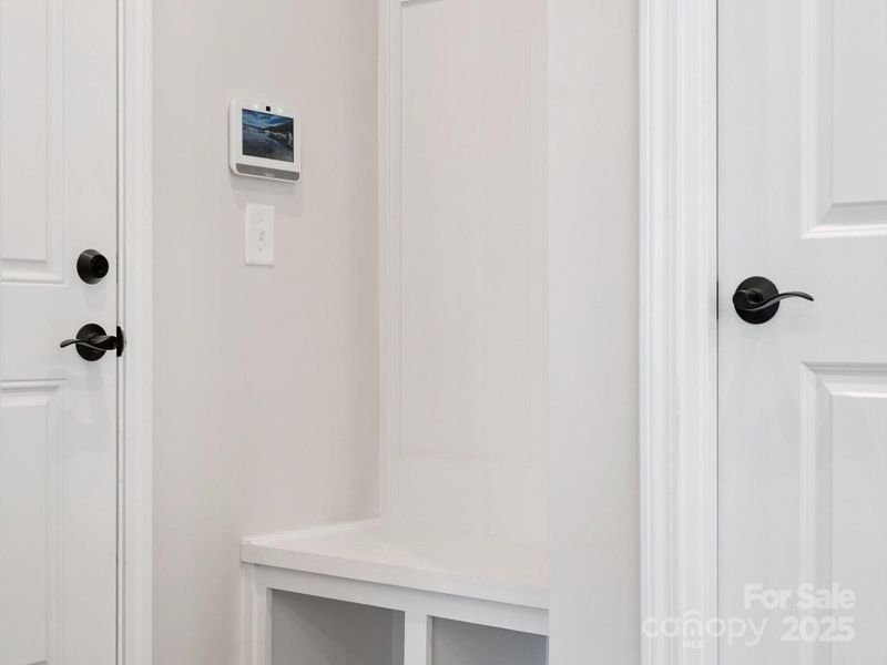 Built-In Drop Zone Creating Convenience at Garage Entry.  *Model Photos | Actual Finishes, Structural Selections, and Orientation May Vary.