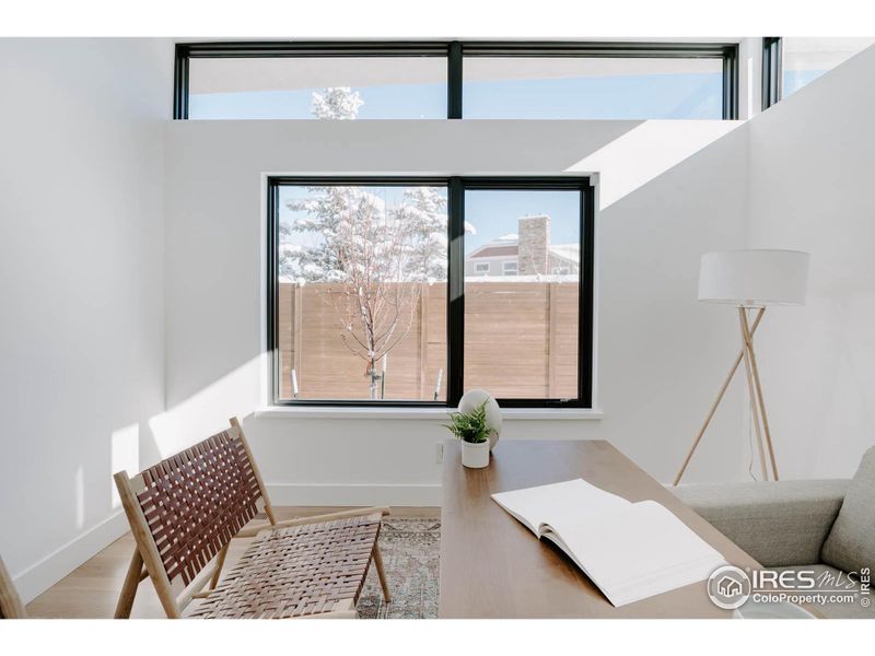 Main level bedroom - as always design accounts for windows and natural light