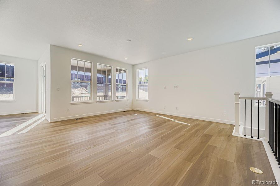 Spacious, unfurnished interior of a new home in Newlin Crossing: The Monarch Collection, Parker (Image 9). Spacious, unfurnished interior of a new home in Newlin Crossing: The Monarch Collection, Parker (Image 9).