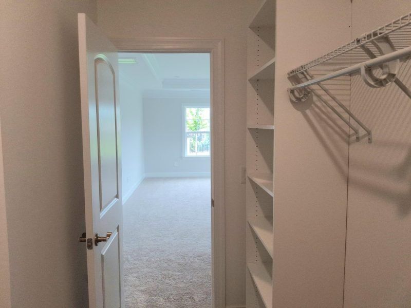 Spacious, unfurnished interior of a new home in Weybridge, Burlington (Image 45).