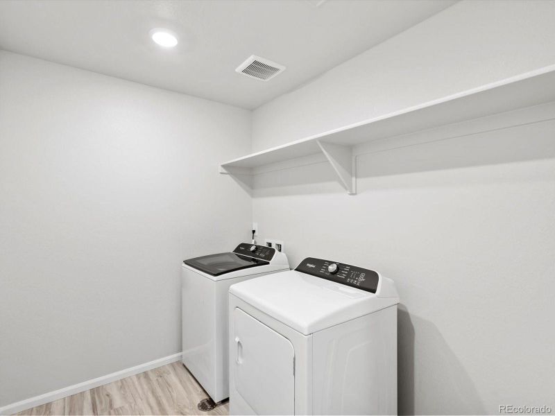 Furnished interior view inside a new home in Ridgeline Vista: The Canyon Collection, Brighton (Image 9).