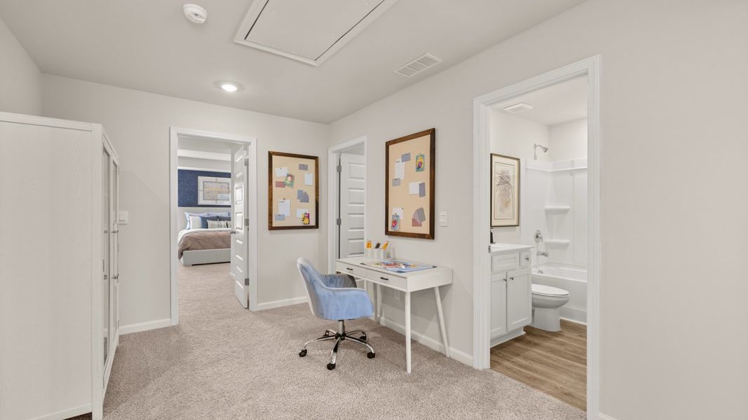 Representative furnished interior of a home built from the Iria Glen by D.R. Horton in Brookland Commons, Monroe (Image 20).