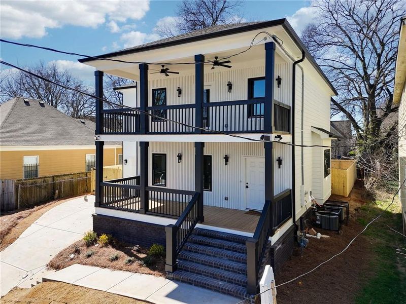 Front exterior of a new home in , Atlanta, GA, highlighting curb appeal (Image 22).
