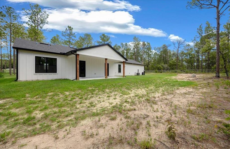 Exterior details and patio area of a home in , Ocala (Image 4).