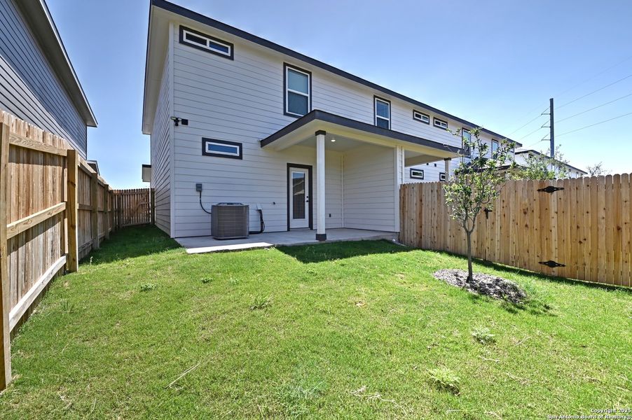 Front exterior of a new home in , San Antonio, TX, highlighting curb appeal (Image 22).