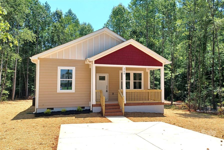 Front exterior of a new home in , Statesville, NC, highlighting curb appeal (Image 15).
