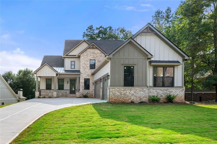 Front exterior of a new home in , Jefferson, GA, highlighting curb appeal (Image 2).