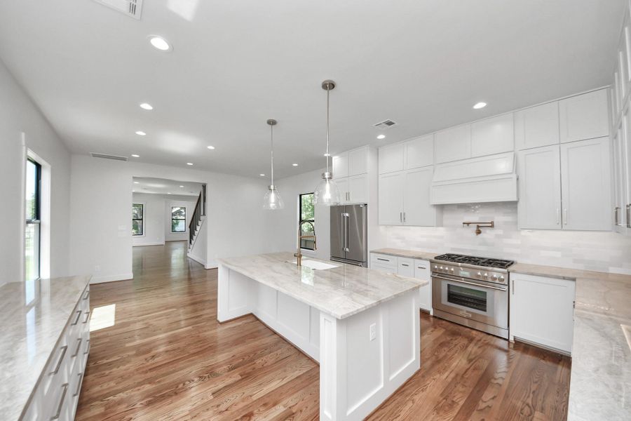 The kitchen features custom-built cabinetry crafted onsite and is outfitted with high end Thermadore appliances The kitchen features custom-built cabinetry crafted onsite and is outfitted with high end Thermadore appliances