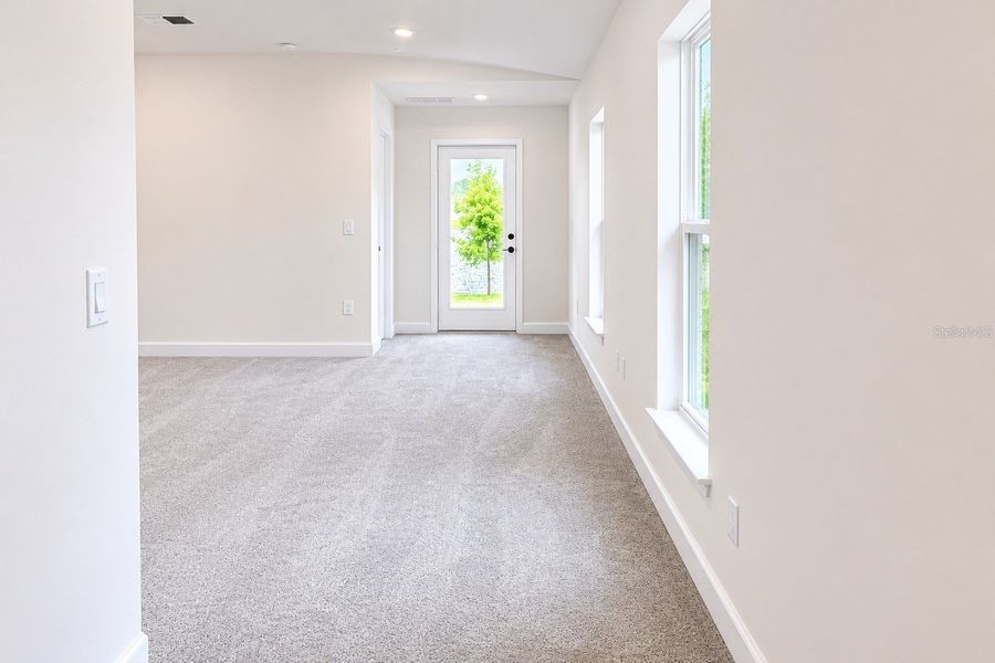 Spacious, unfurnished interior of a new home in Harmony Central, St. Cloud (Image 11).