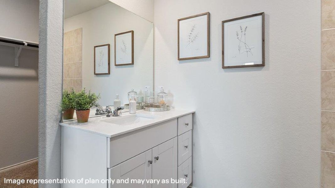 A well-appointed bathroom vanity features a broad mirror and clean lines for daily routines. A well-appointed bathroom vanity features a broad mirror and clean lines for daily routines.