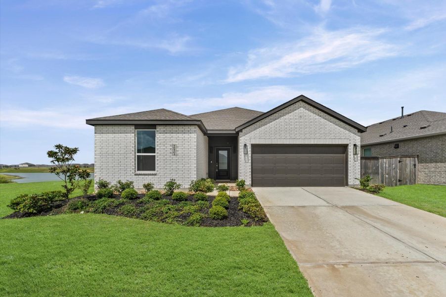 Front exterior of a new home in The Grand Prairie, Hockley, TX, highlighting curb appeal (Image 2).