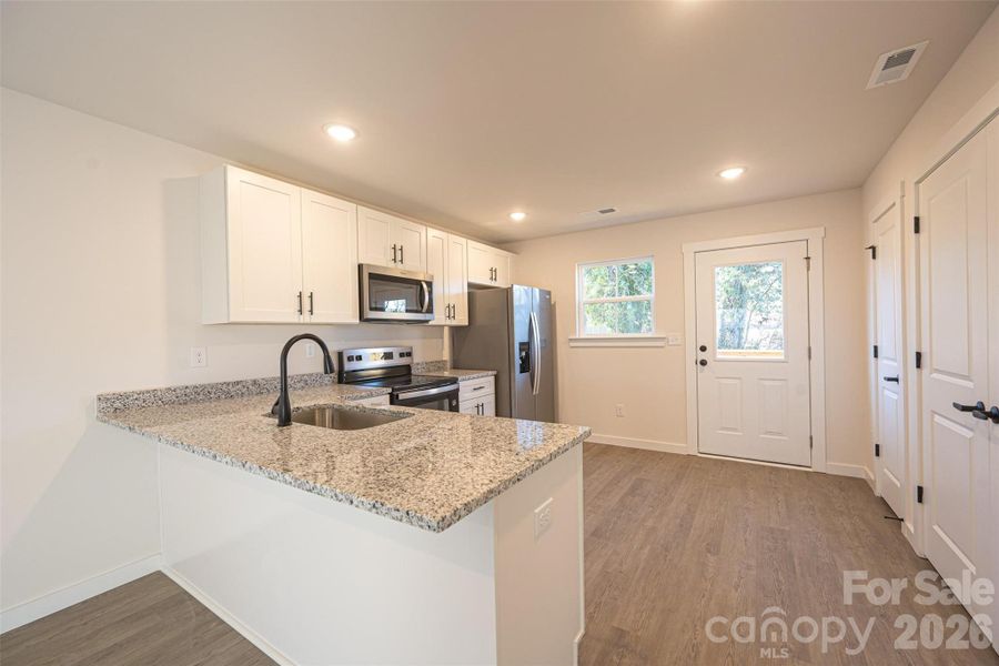 Furnished interior view inside a new home in , Hickory (Image 5).