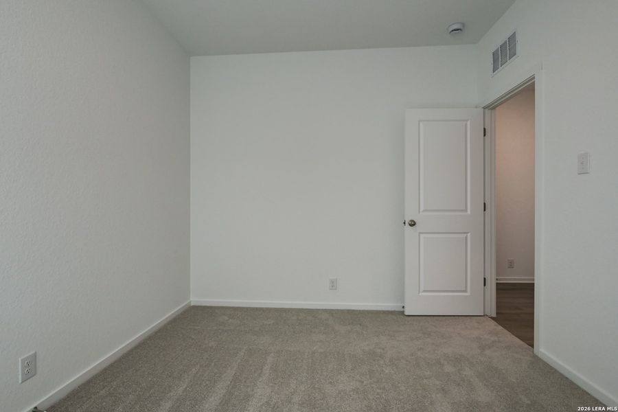 Spacious, unfurnished interior of a new home in Hennersby Hollow, San Antonio (Image 17).