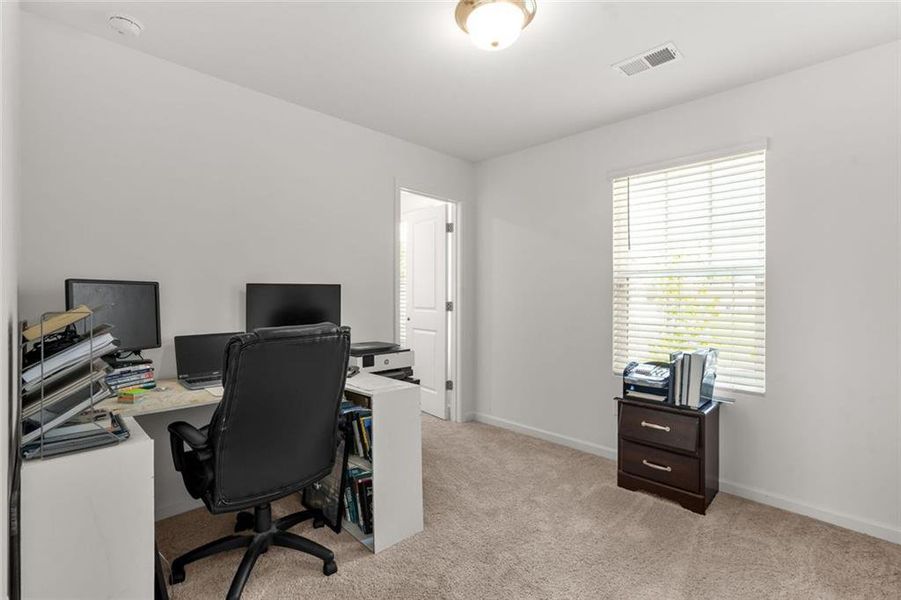 Furnished interior view inside a new home in Alder Park, Conyers (Image 9).