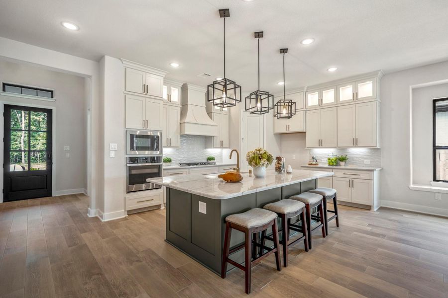 Furnished interior view inside a new home in ARTAVIA, Conroe (Image 5).