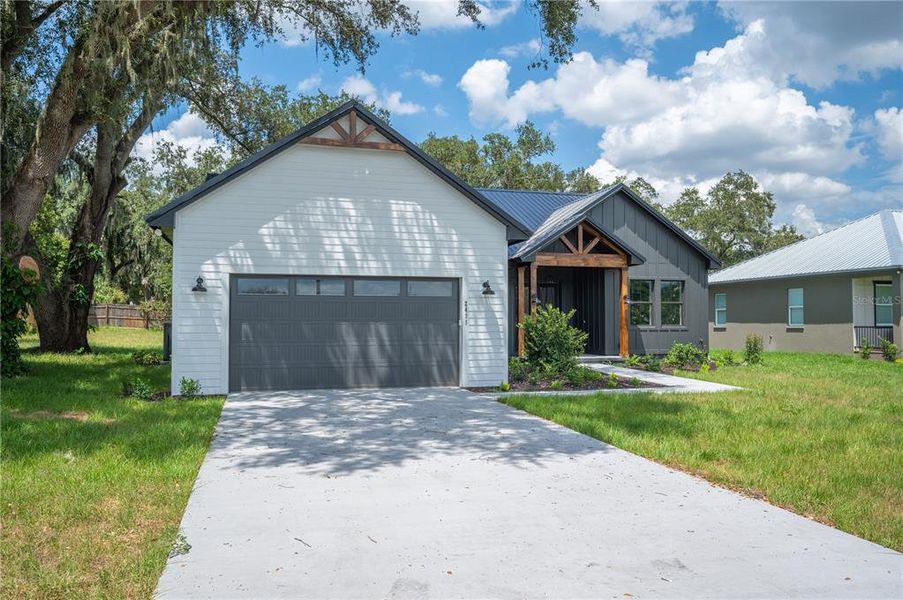 Front exterior of a new home in , Lakeland, FL, highlighting curb appeal (Image 1). Front exterior of a new home in , Lakeland, FL, highlighting curb appeal (Image 1).