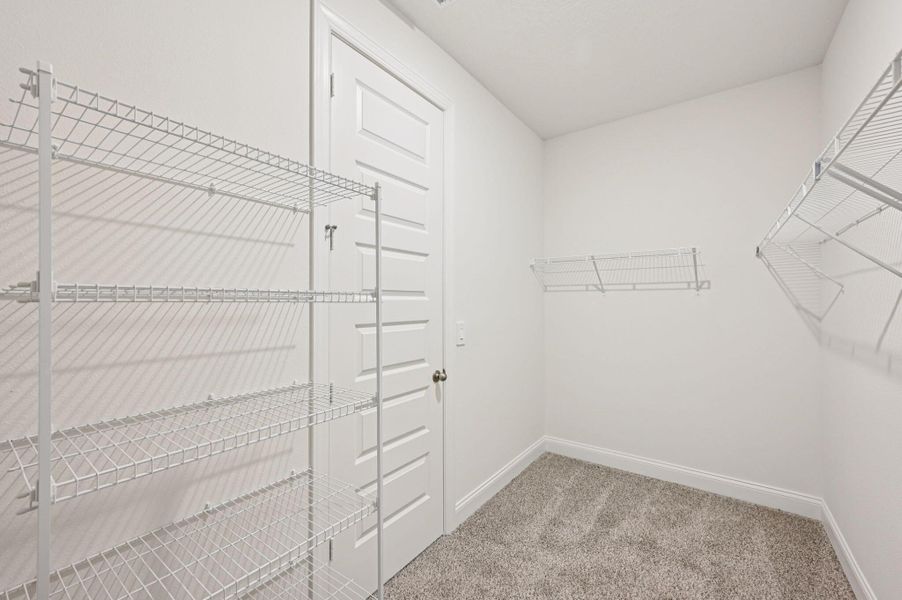 Furnished interior view inside a new home in Hampton Park - Signature Series, Vero Beach (Image 12). Furnished interior view inside a new home in Hampton Park - Signature Series, Vero Beach (Image 12).