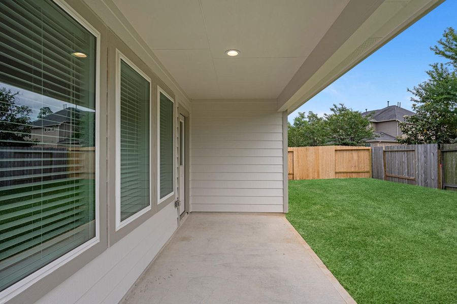 Exterior details and patio area of a home in Barton Creek Ranch, Conroe (Image 4). Exterior details and patio area of a home in Barton Creek Ranch, Conroe (Image 4).