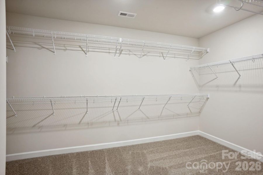 Photo is not of the actual home, but is an inspirational photo of builder’s model home and may depict options, furnishings, and/or decorator features that are not included