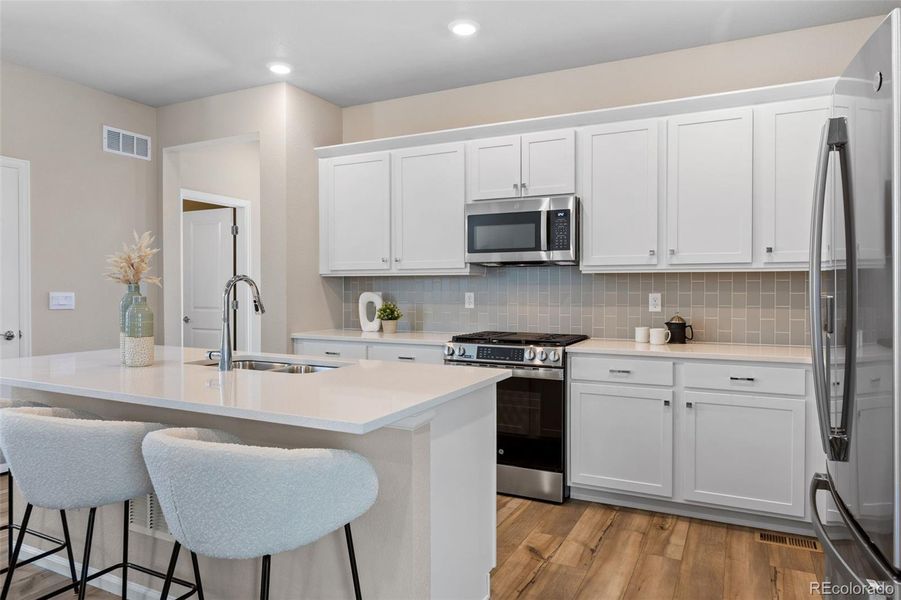 Furnished interior view inside a new home in Woodrose at Painted Prairie, Aurora (Image 7). Furnished interior view inside a new home in Woodrose at Painted Prairie, Aurora (Image 7).