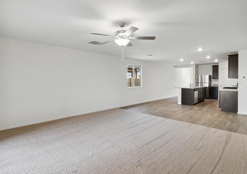 Open-concept layout with the kitchen connected to the family room.